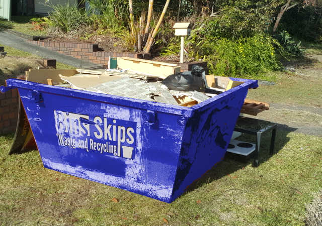 Loading a Skip Bin in Hornsby in preparation for pick-up