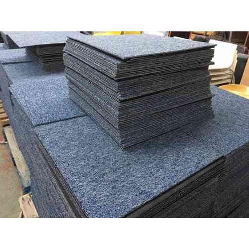 Stack of blue grey carpet tiles