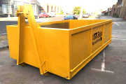 10m Hook-lift Bins take about the same amount of room as a car )i.e. they fit in a car parking space)