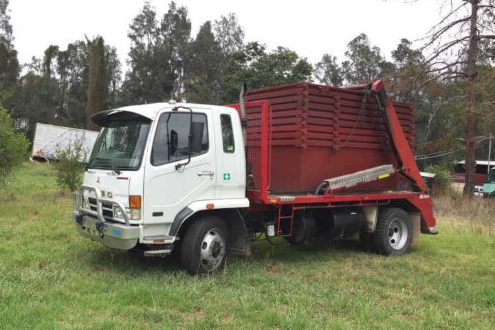 Skip Bin Truck carrying Marrel skip bins