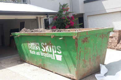 A soil skip bin filled with clean-fill